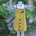 Unique knitted fully lined mustard colour bubble dress. By `Tsega`.  Size 34. Good condition.