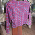 Cute slip-over long sleeve maroon top with blue design 13/14 year old. Round neckline. By RT.As new.