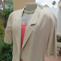 Best quality `Miss Lynn by Manhattan` box style beige short sleeve jacket. Size 42/18. New condition
