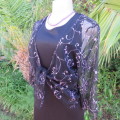 Glamorous black netting long sleeve bolero style cover-up by `St. Bernard` Size 38/14. New condition