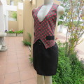 Full apron in heavy black cotton with 2 pockets Resembles pants with waistcoat. Straps to tie.As new
