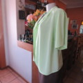 Lime green soft and silky button down top. Rounded fronts Size 42-44 by `Fashion Bug`  New condition