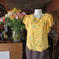 Very sweet little cropped mustard top with colourful floral posies. Size 36/12. By `Edition`. As new