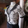 State of the art  cropped special occasion top. In size 30/6. Boutique made. New condition.