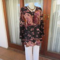Bohemian look slip-over long sleeve top. V-neckline. Size 44/20 by `Penny C`. New condition.