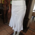 Charming white gored skirt with unique rounded panels. By `Identity` in size 34/10. As new.