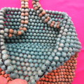Chic wooden bead shoulder bag in peach and jade beads. Size 52 x 21cm.No lining.New condition.