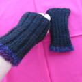 Hand knitted black fingerless mittens. Handy for work. Size Medium to Large. With purple edging.