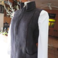 Warm black suede look  zip-up waistcoat. Polyester inner. Size 36/12 by `Woolworths`. New condition.