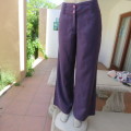 Wide legged pants by `Queenspark` in size 36/12. In 100% linen. Very dark purple. As new.