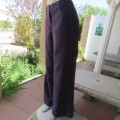 Wide legged pants by `Queenspark` in size 36/12. In 100% linen. Very dark purple. As new.