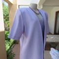 As new open hanging boutique made polyester jacket in soft lilac colour.Short sleeves. Size 42/18.