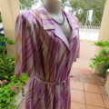 Beautiful vintage dress in white with lilac,mustard and beige lines. By JANE LANFORD size 50. As new