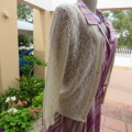 Lace pattern knitted cardigan in light cream colour by WOOLWORTHS in size 34/10. Very good cond.