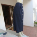 Smart navy button down skirt in blend of viscose and polyester. By WOOLWORTHS. Size 44/20 .