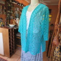 Seagreen owner made acrylic lace open hanging cover up top. Size 46 to 48. Elbow length. As new.