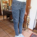 Dark skinny leg denim jeans in stretch polycotton. Pockets back and front.Size 32/8 by RT.Good cond.
