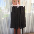 Black pant jumpsuit with back crossover straps by SARAH ZAIN from UK. for 13 to 14 yr old .As new