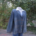 Denim long sleeve jacket closing with 3 buttons. Wide open collar. Size 46/22. Distressed look.