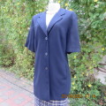 Smart navy tailored jacket with 3 buttons on front.Open collar. Slit seam pockets.Size 42/18.New con