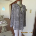 Trendsetting slip over top in black and white small patterns.Size 46/22 by IMAGE.100% viscose.As new