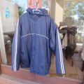Zippered navy size XL hooded jacket.Outer in water resistant polyester.Inner fleece polyester.As new