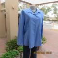 As new skyblue button down shirt with princess cut on front. Shirt collar. By ENVOY in size 42/18.