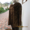 Warm polyester velvet animal print golden brown and caramel long sleeve slip over top.Size 42/18