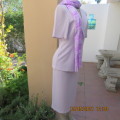 Amazing 2 pc skirt suit in soft lilac.Tailored short sleeve jacket and pencil skirt.Size 32/8.WOOLW.