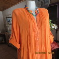 Eyecatching tangerine 100% cotton button down top with tucked decoration.By DONATELLA size 46/22