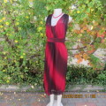 Glamour special occasion dress in red wine shades.Worn once on cruise ship! By DONNA CLAIRE.Size 42