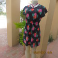 Sweet size 36/12 slip over mini dress with black/white polkadot background and floral design.