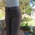 Classic light brown striped cropped pants in firm polycotton stretch fabric.Size 32/8. As new.