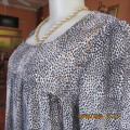 Fabulous monochrome animal print 2 layer loose top with embellished front yoke. Size 36/12.As new