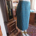 Feel sensational in this winters woven check lined pencil skirt in blues and gold.By ALVECO size 38