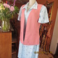 Sleeveless rosepink open jacket in size 34 to 36. Polyester/linen blend. 2 large pockets.As new.