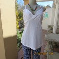 Must have size 44/20 white cotton strappy top.High quality from the USA. By BBC. As new.