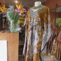 Easy to wear bo-ho patterned kaftan in 100% rayon. Size 38 to 42. Tiestring in waist. New condition.