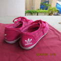 Pair Adidas tekkies in Magenta pink. Guaze patterned sides. Sides 37/4. As new condition.