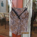 Cute animal print sexy top with adjustable thin straps by RT DENIM. Size 30/6.Fold over bust.As new