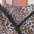 Cute animal print sexy top with adjustable thin straps by RT DENIM. Size 30/6.Fold over bust.As new