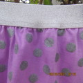 Cute little lilac skirt with wide silver elasticated waistband. By LOLLIPOP for girls 6-7 years old.
