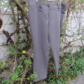 Mottled brown+beige straight legged pants with wide yoked waistband. By FASHION EXPRESS size 44/20.