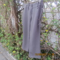 Mottled brown+beige straight legged pants with wide yoked waistband. By FASHION EXPRESS size 44/20.