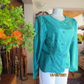 Haute Couture emerald green silk top by ADELE DALLAS ORR in size 36/12. As new.