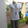 Pretty white capped sleeve feminine T shirt. Size 38/14 by WOOLWORTHS in stretch cotton. As new.