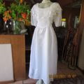 Beautiful classic white wedding dress. Size 38/14. In bride satin+embroidered chiffon. New condition