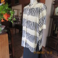 Animal print short sleeve button down top in size 42/18. In 100% polyester fabric. Very good cond.