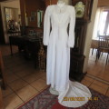 Fabulous vintage style wedding dress with long puffed sleeves. Size 36/12. Large size. New condition
