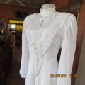 Fabulous vintage style wedding dress with long puffed sleeves. Size 36/12. Large size. New condition